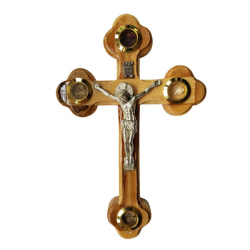 Olive Wood Crucifix Wall Cross adorned with olive leaves, frankincense, flowers and stones from Jerusalem Hand Crafted by Artisans in Bethlehem